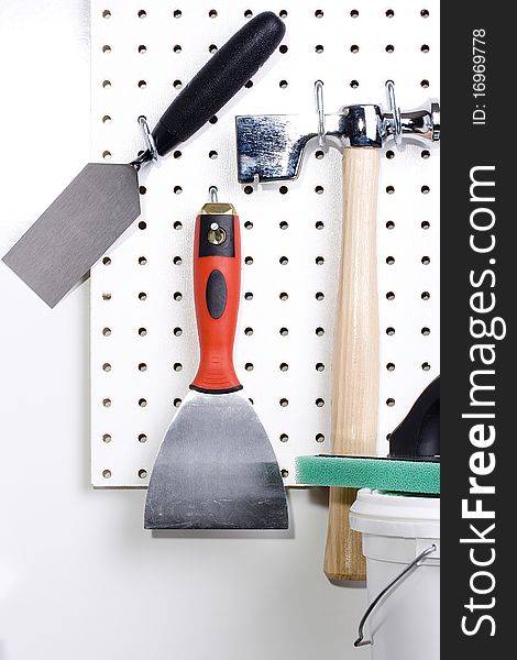 Different tools used for wall plastering and home improvement. Different tools used for wall plastering and home improvement.