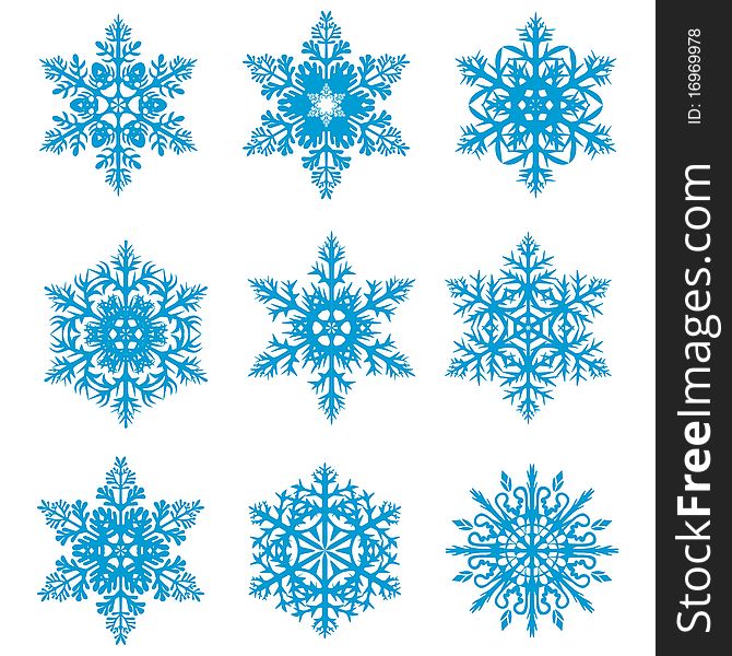 Snowflakes of different shapes on a white background