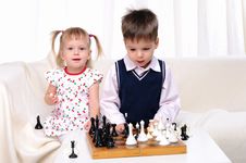 Brother And Sister Playing Chess Stock Images Brother And Sister Playing Chess Stock Images