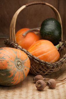Ripe Pumpkins In Woven Basket And Poppy On Table Stock Image Ripe Pumpkins In Woven Basket And Poppy On Table Stock Image