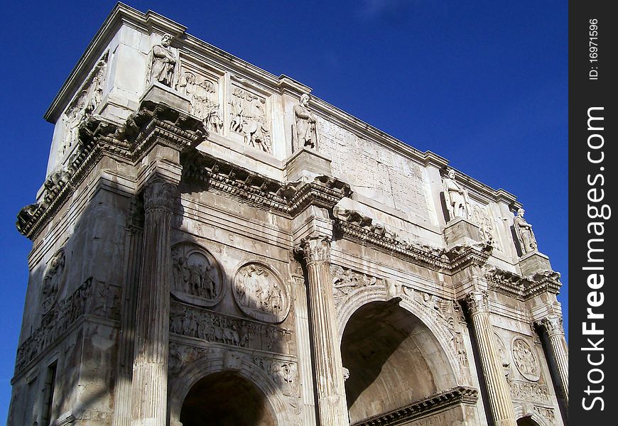 The arch of constantine next to the coliseum in rome. The arch of constantine next to the coliseum in rome