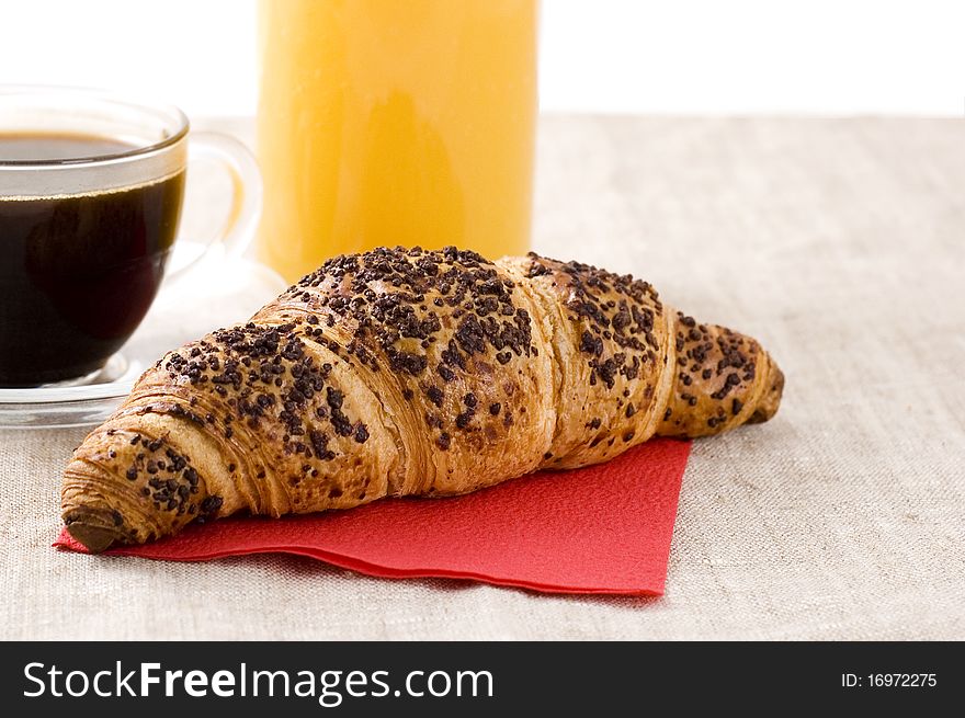 Coffee, juice and croissant with chocolate. Coffee, juice and croissant with chocolate
