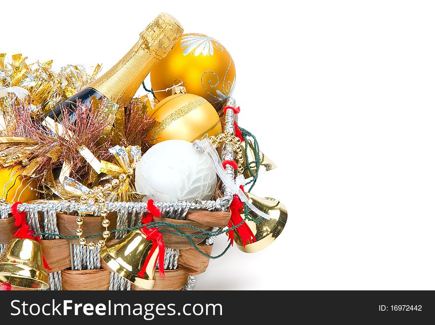 New Year's decoration in a wooden basket with hand bells. New Year's decoration in a wooden basket with hand bells