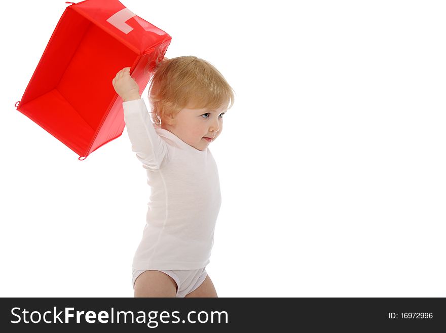 1 year old baby throwing red box isolated on white