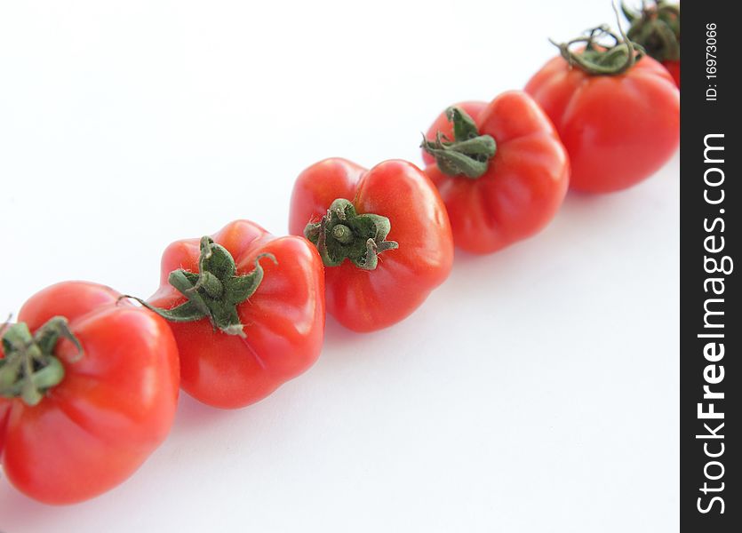 Ripe Red Tomatoes On White Background