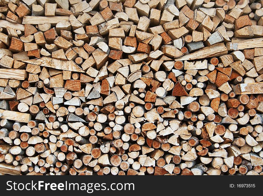 Neatly put chopped firewood in Switzerland