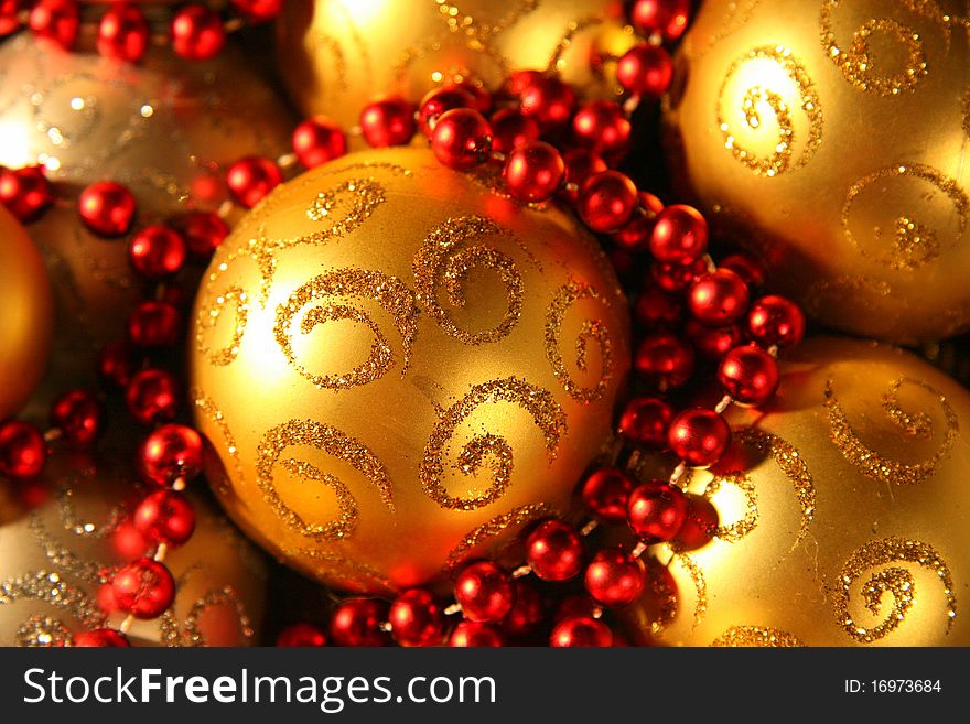 Gold-colored Christmas decorations close-up. Gold-colored Christmas decorations close-up