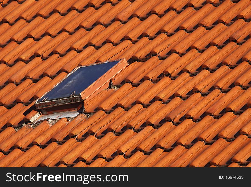 The modern roof consisting of roof tiles and the skylight.