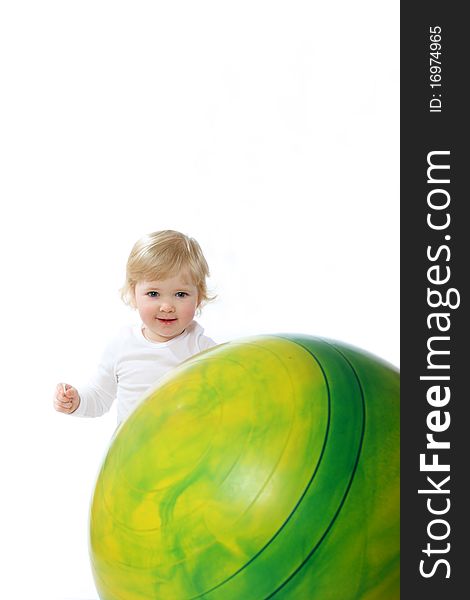 Portrait of a baby with gymnastic ball isolated on white. Portrait of a baby with gymnastic ball isolated on white