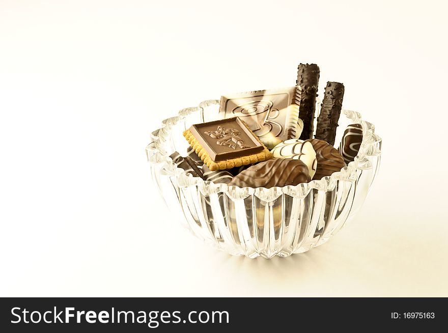 Chocolate in a vase on a white background