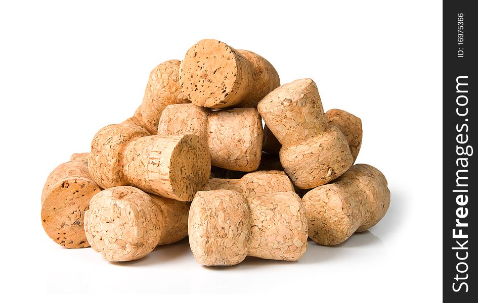 Pile of corks on a white background