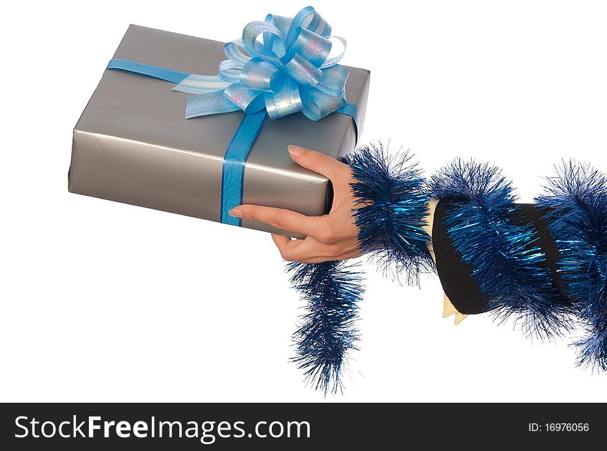 Woman giving a silver box with blue bow as a gift for christmas. Woman giving a silver box with blue bow as a gift for christmas