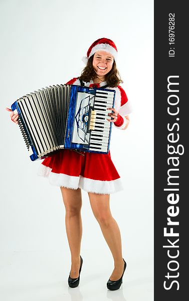 The woman santa-klaus plays for all an accordion.