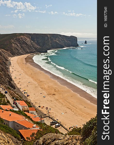 The beautiful Portuguese beach, with a rocky coastline.