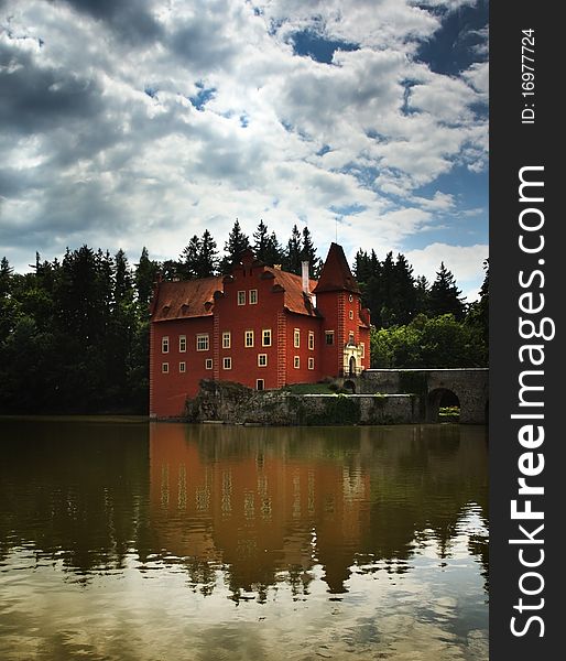 Water castle Cervena Lhota in Czech Republic and clouds. Water castle Cervena Lhota in Czech Republic and clouds.