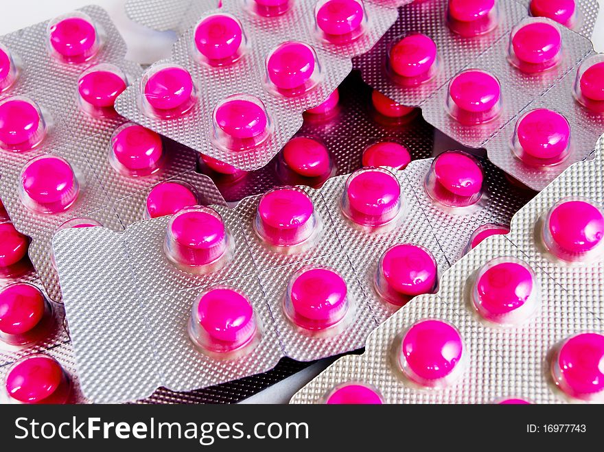 Pack of pink medicine pills