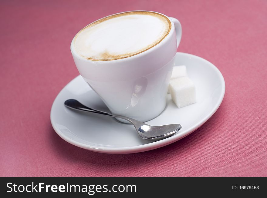 The close-up photo with cup of coffee