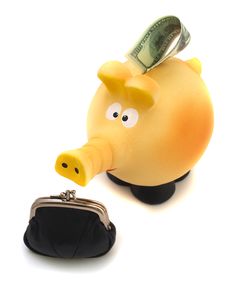 Piggy Piggy Bank With A Black Purse Stock Images