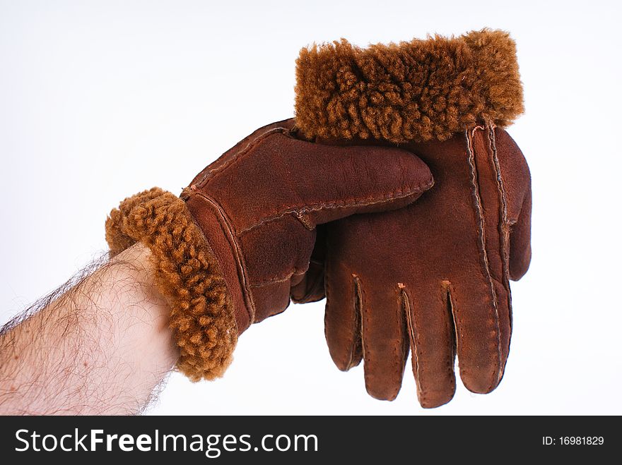 Brown leather gloves isolated on white background