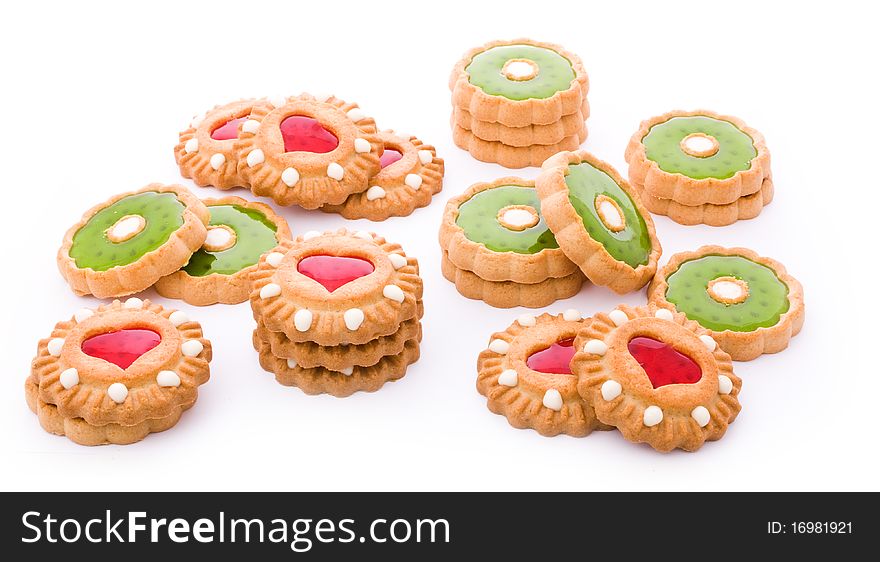 Close up shot of red and green cookies isolated on white