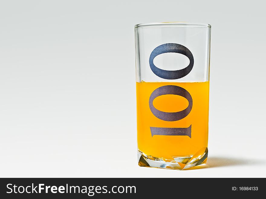 Isolated 100 glass with orange juice