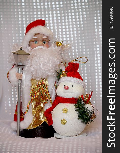 Toy Santa Klaus with snowman photography. Toy Santa Klaus with snowman photography