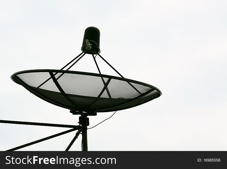 Big Black Satellite Dish isolated on White sky, home roof