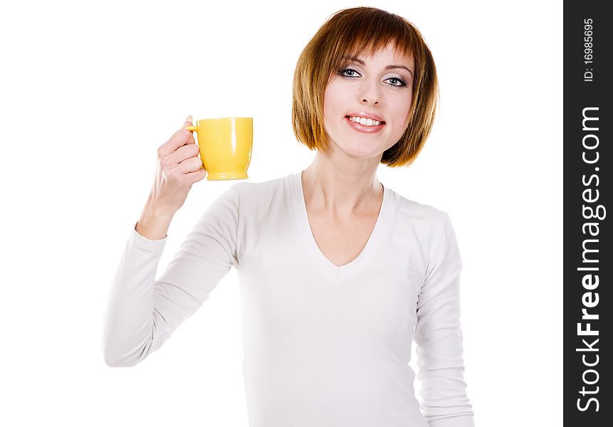 Lovely young woman with a cup of tea against white background. Lovely young woman with a cup of tea against white background