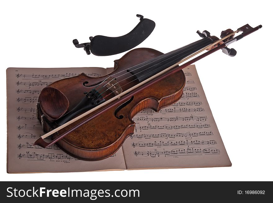 Violin with the bow and notes on a white background, Isolated