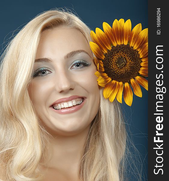 The Beautiful Girl With A Sunflower