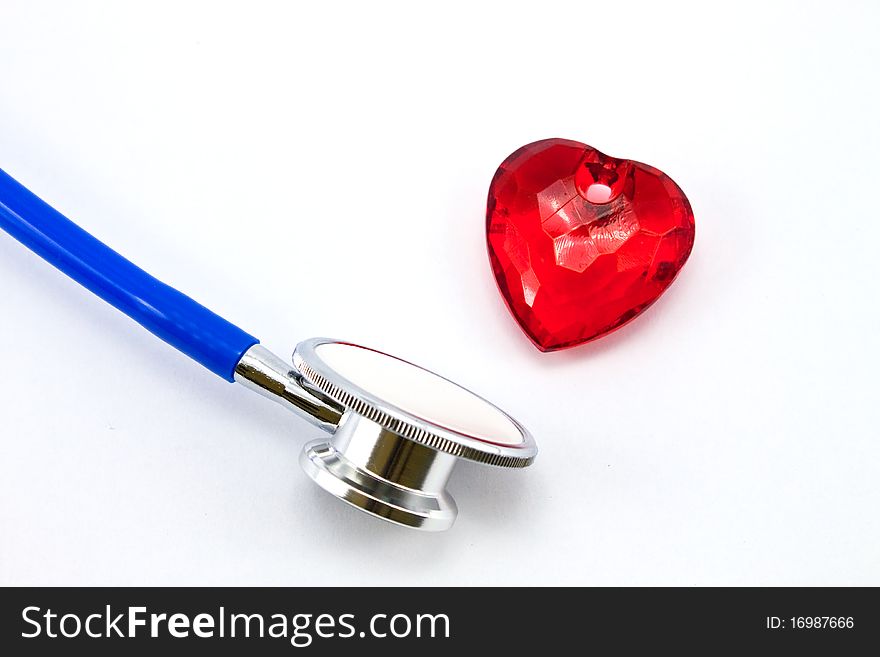 Heart and a stethoscope on a white background. Concept for cardiology.