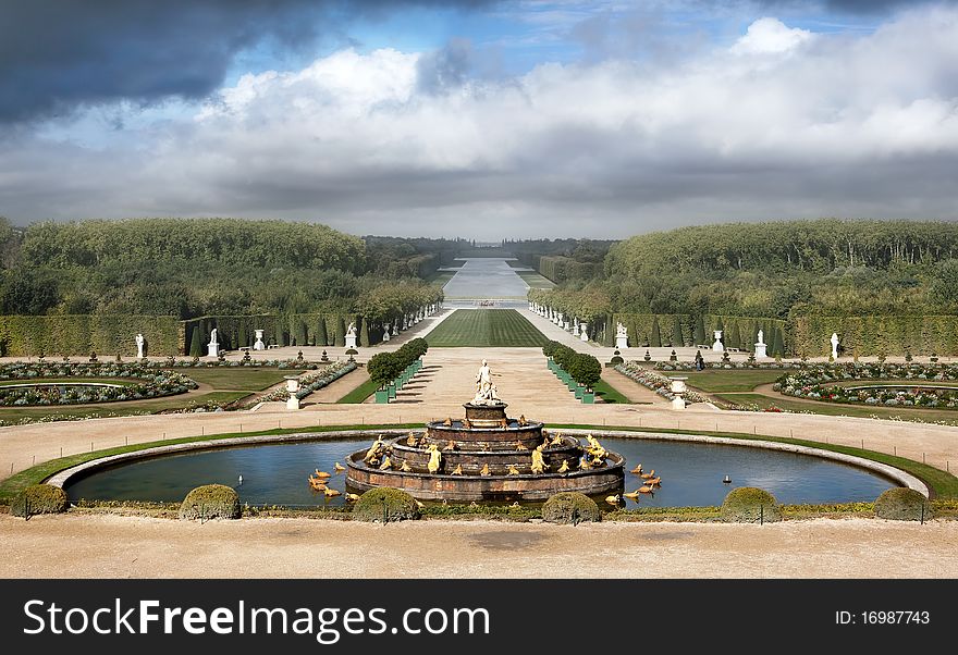 Kind on a fountain, sculptures and park in Versailles, France. Kind on a fountain, sculptures and park in Versailles, France.