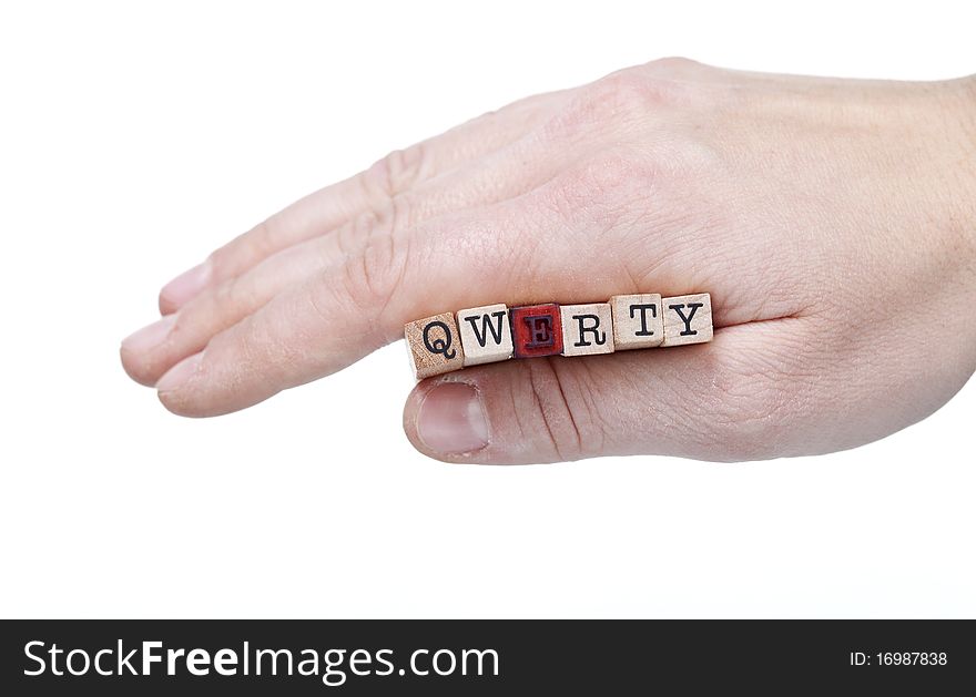 Female Hand Holding QWERTY Letters