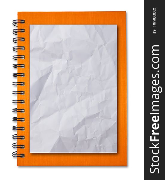 Crumpled paper on Orange notebook