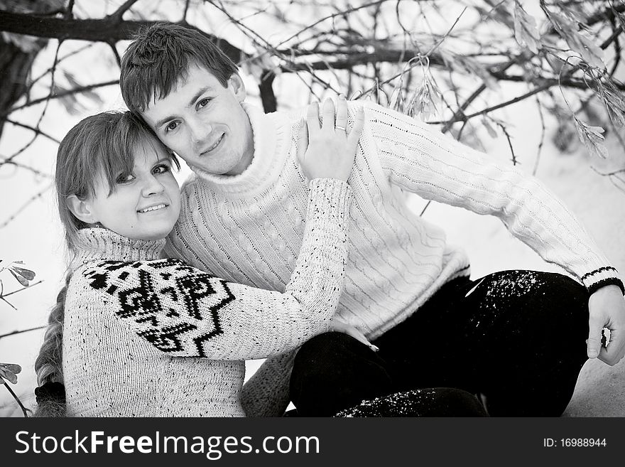 Young couple in love smiling and hugging. Young couple in love smiling and hugging