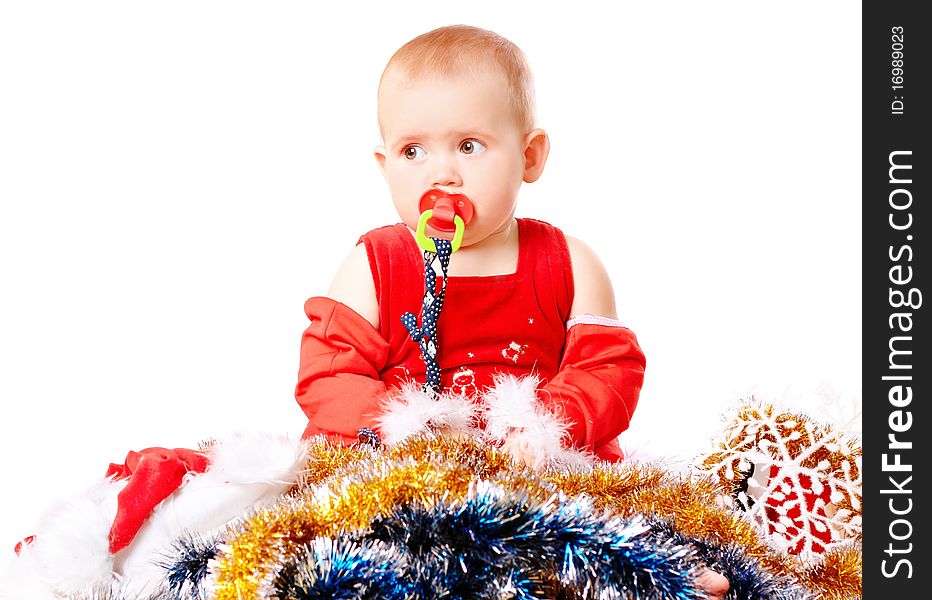 Baby in Santa Claus hat on white background