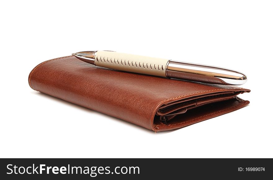 Brown purse with pen on white background