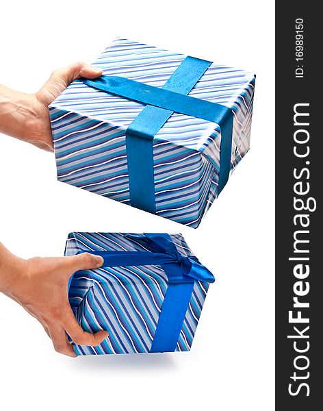 Two blue gifts boxes in man's hands. Studio shot. Two blue gifts boxes in man's hands. Studio shot