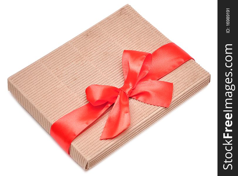 Gift box and red ribbon isolated on white background