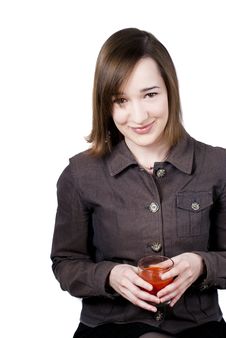 Smiling Girl Holding The Glass Of Tomato Juice Royalty Free Stock Photography