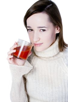Girl Drinking The Glass Of Tomato Juice Stock Photos