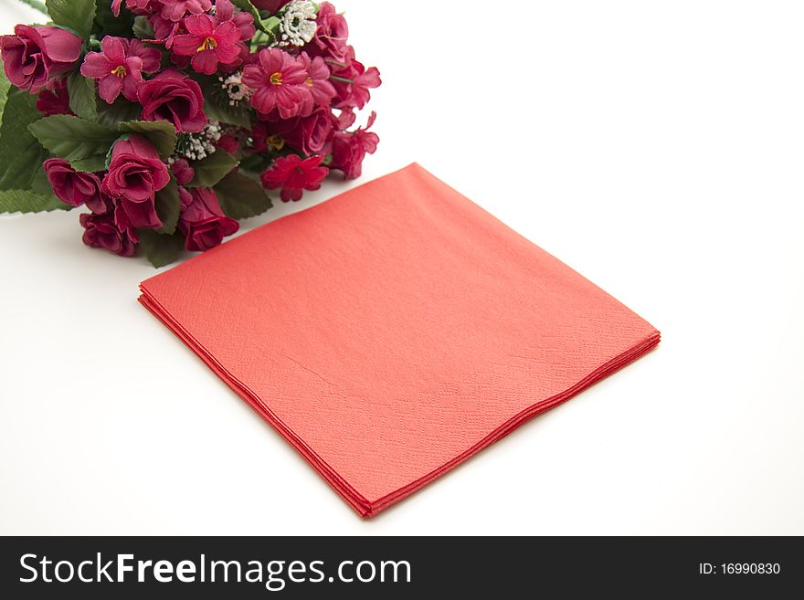 Bunch of flowers with red paper napkin