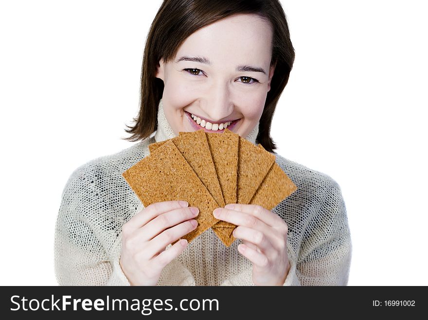 Smiling girl holding bread crisps isolated