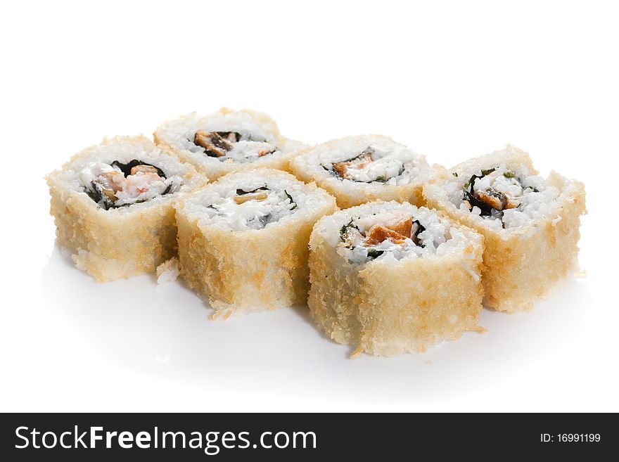 Sushi maki with eel on white ground