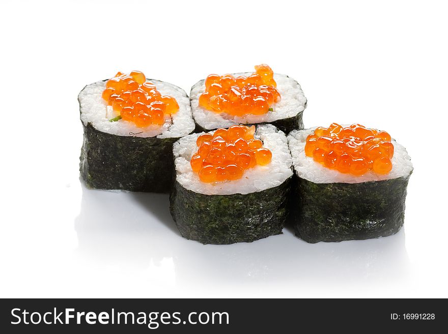 Sushi maki with red caviar on white ground. Sushi maki with red caviar on white ground