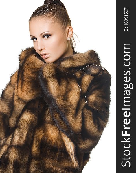 Beautiful woman in a fur coat