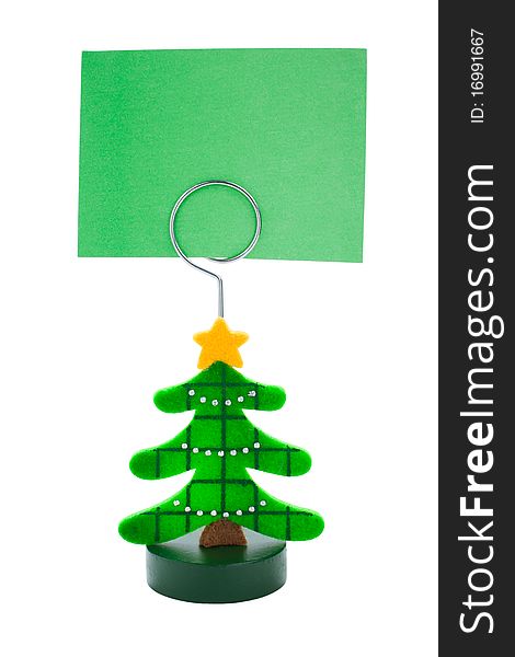 Green note paper in Christmas tree sticker holder on a white background