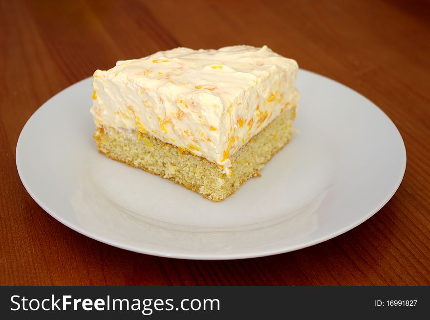 Luscious slice of a tangerine-cream-cake. Luscious slice of a tangerine-cream-cake.