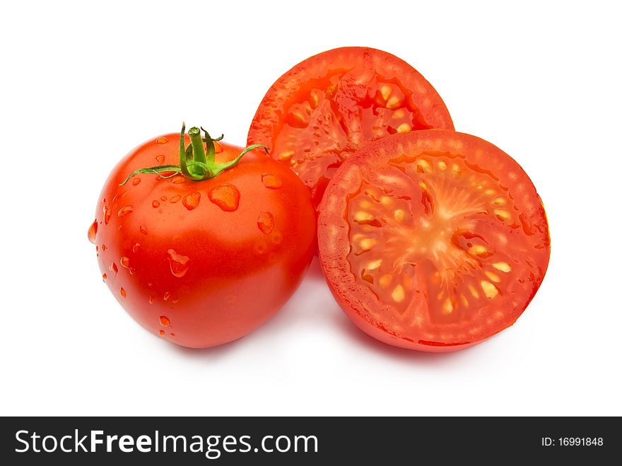 Tomatoes (whole and sliced) isolated on white