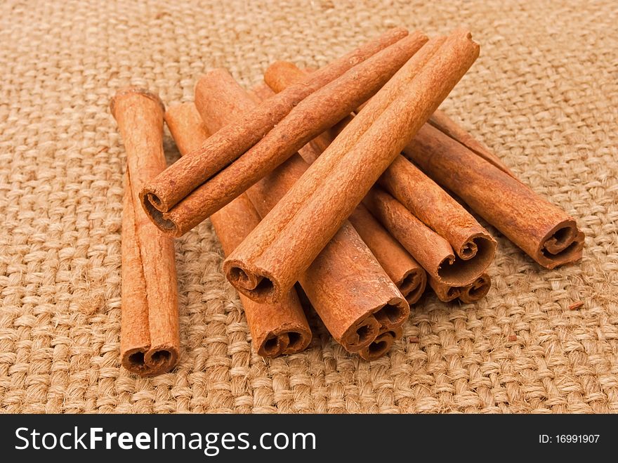 A pile of cinnamon sticks on a canopy